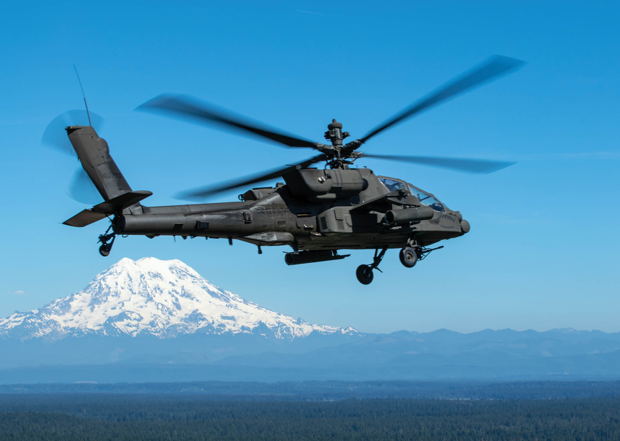 A helicopter is flying over a mountain with a snowy peak. AI generated content