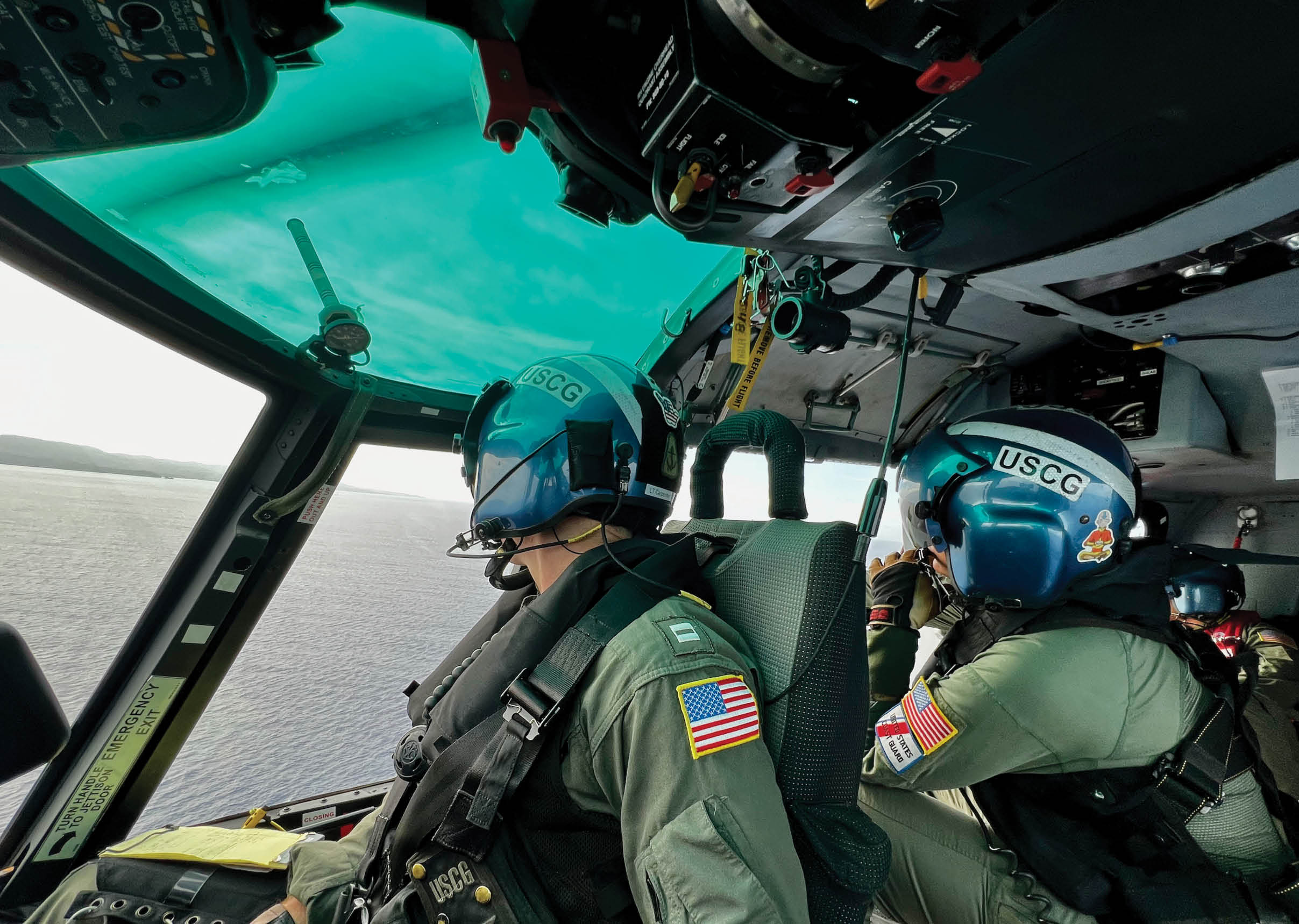 Two pilots in a helicopter, one on the left and one on the right, wearing helmets and gear. AI generated content