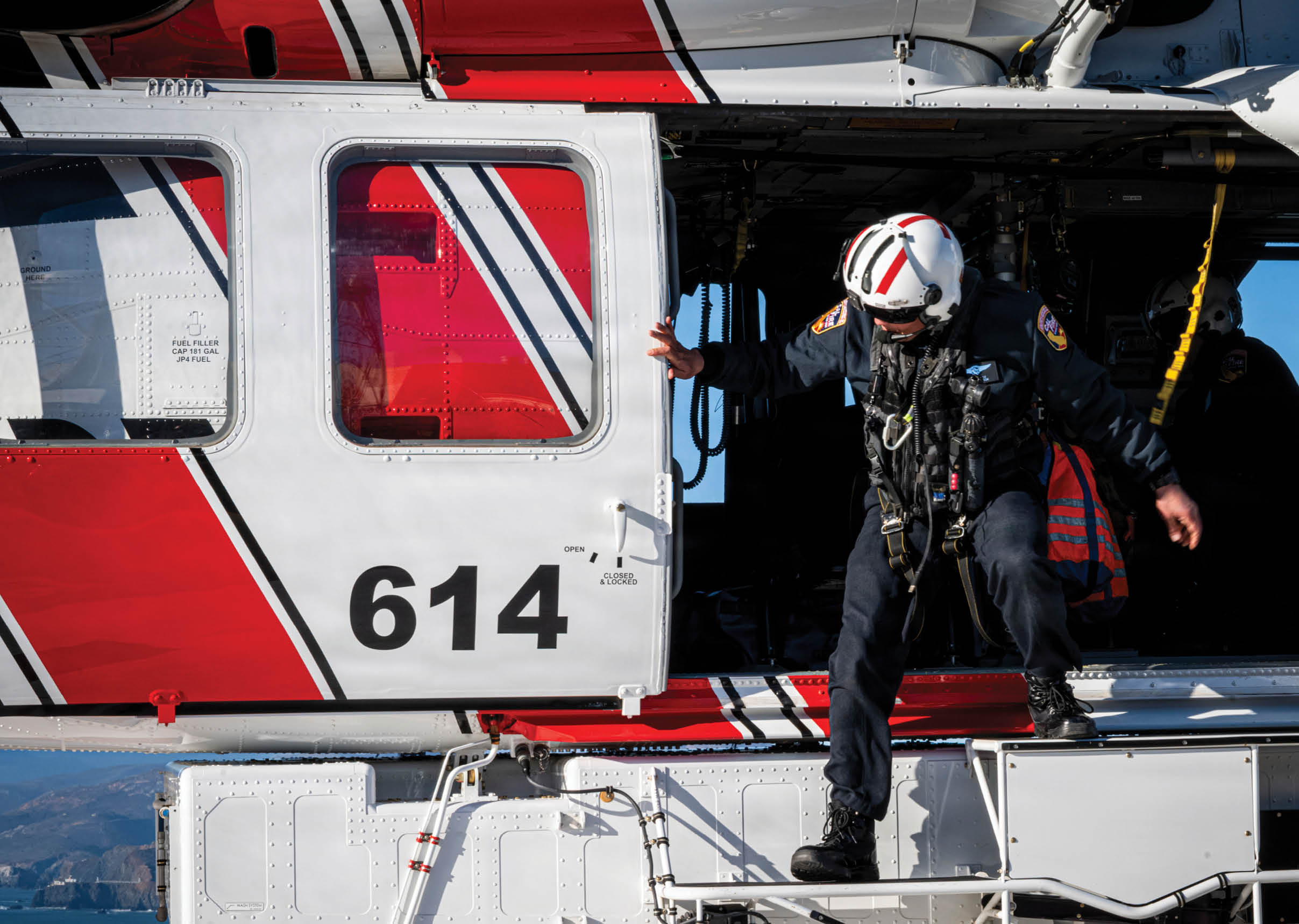 A man wearing a helmet is climbing into a helicopter. AI generated content