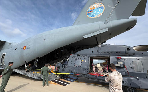 A group of men are loading a helicopter with cargo. AI generated content