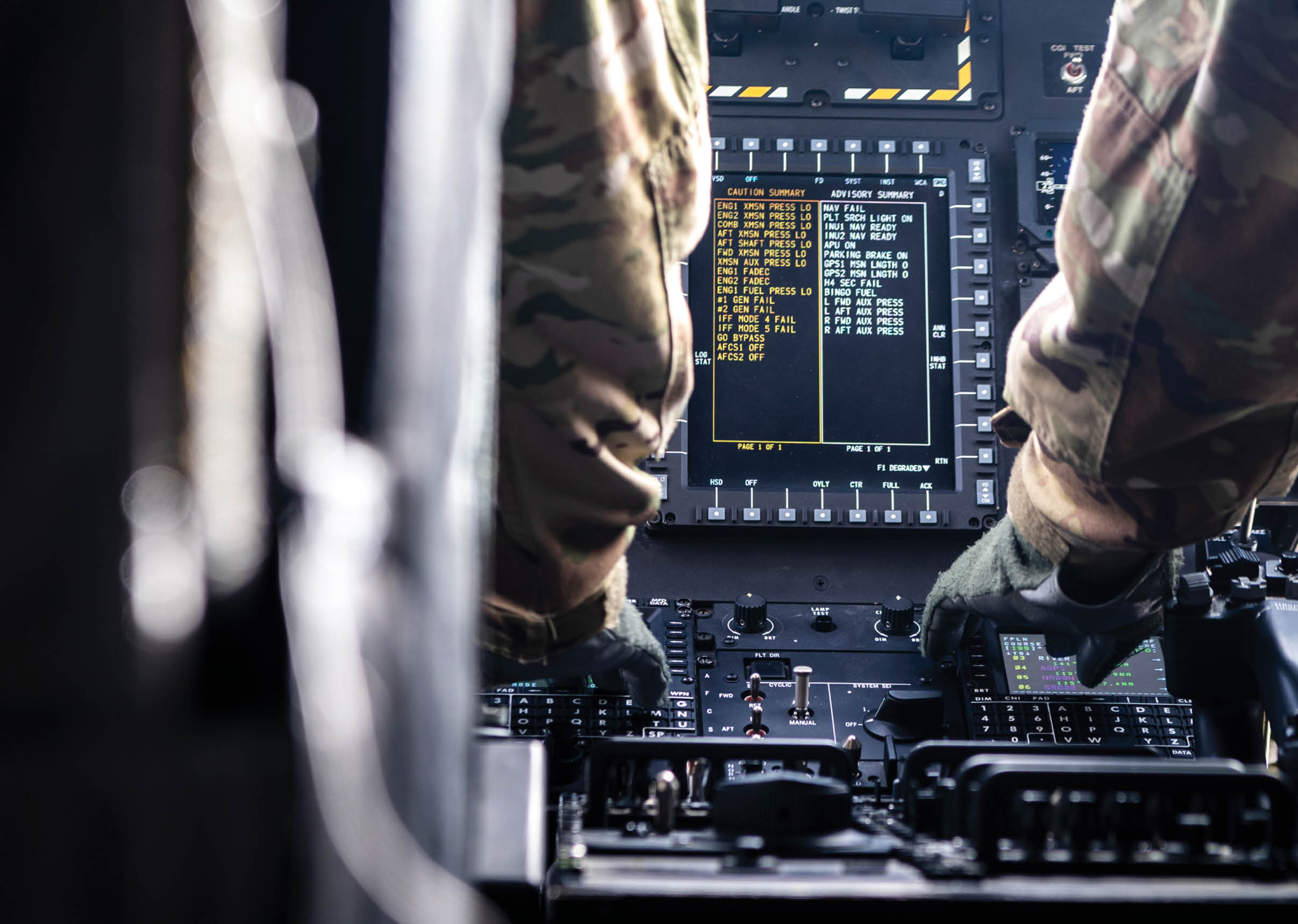 Two men are in a cockpit of a plane. Description generated by AI