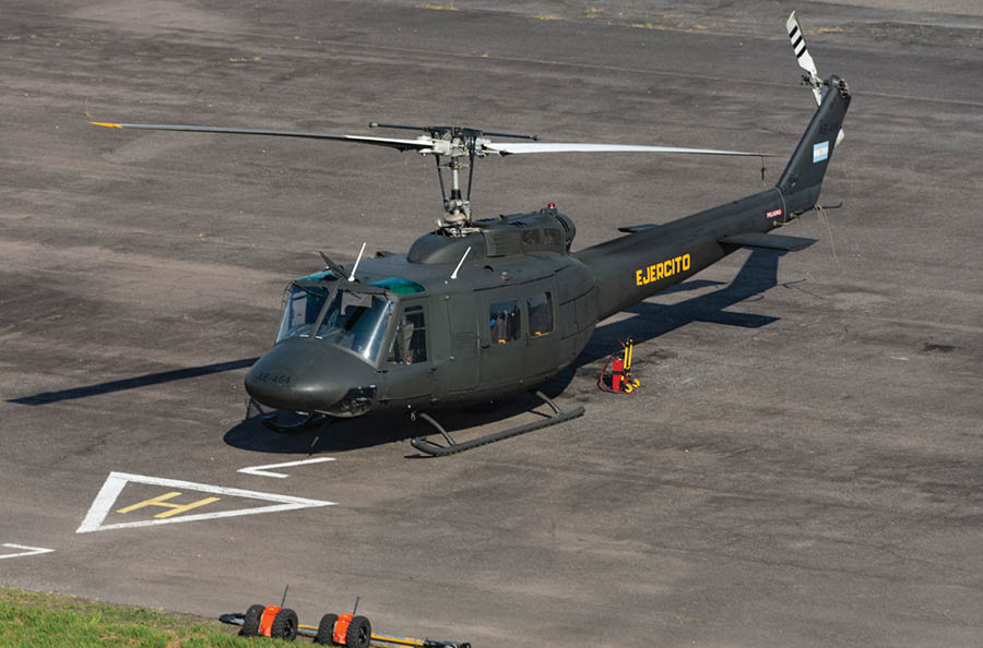 A helicopter with the letters LAC on the side. Description generated by AI