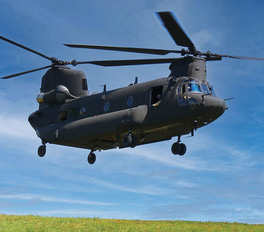 A helicopter is flying in the sky. Description generated by AI