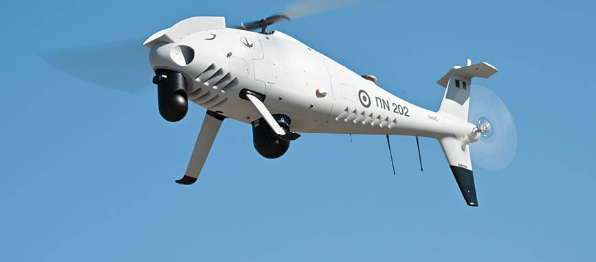 A helicopter is flying in the sky. Description generated by AI