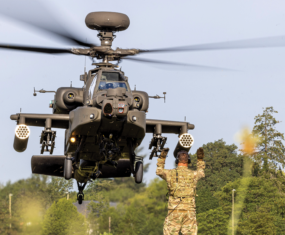 A helicopter flying in the air. Description generated by AI