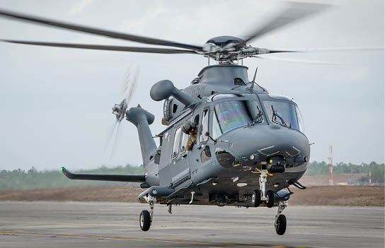 Three helicopters flying in the sky. Description generated by AI
