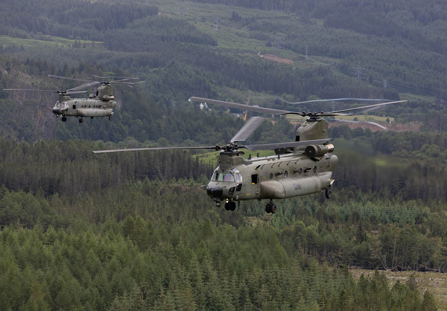 A helicopter with a camera mounted on the front. Description generated by AI