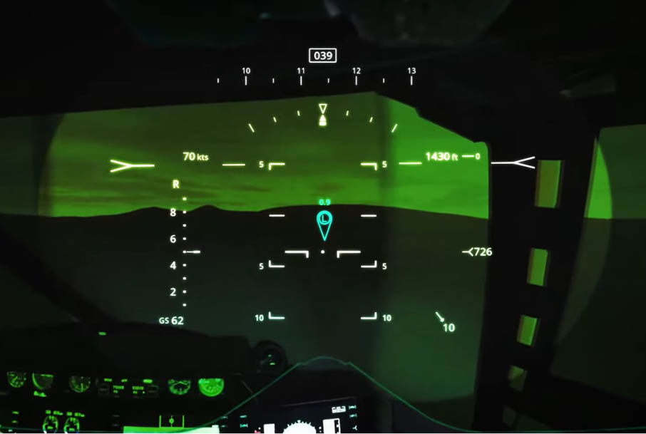A green-tinted heads-up display shows flight information including speed, altitude, and directional indicators against a dark sky background. Description generated by AI