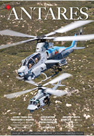 A helicopter is flying in the air. Description generated by AI
