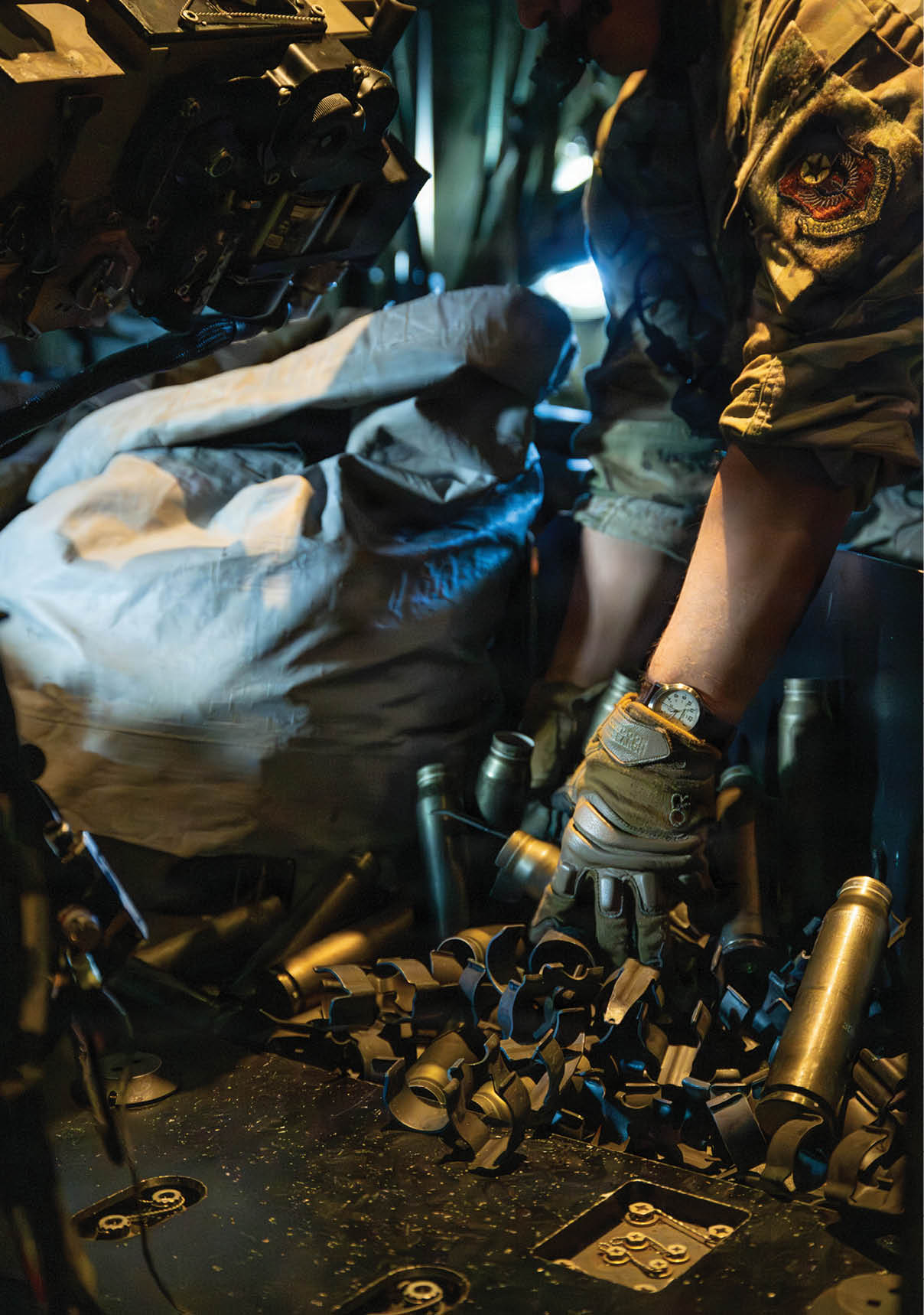 A man in a military uniform is working on a vehicle. AI generated content