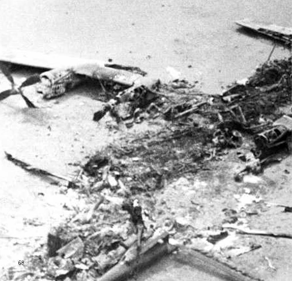A black and white photo of a plane crash site with a plane on the ground and a person standing nearby. AI generated content