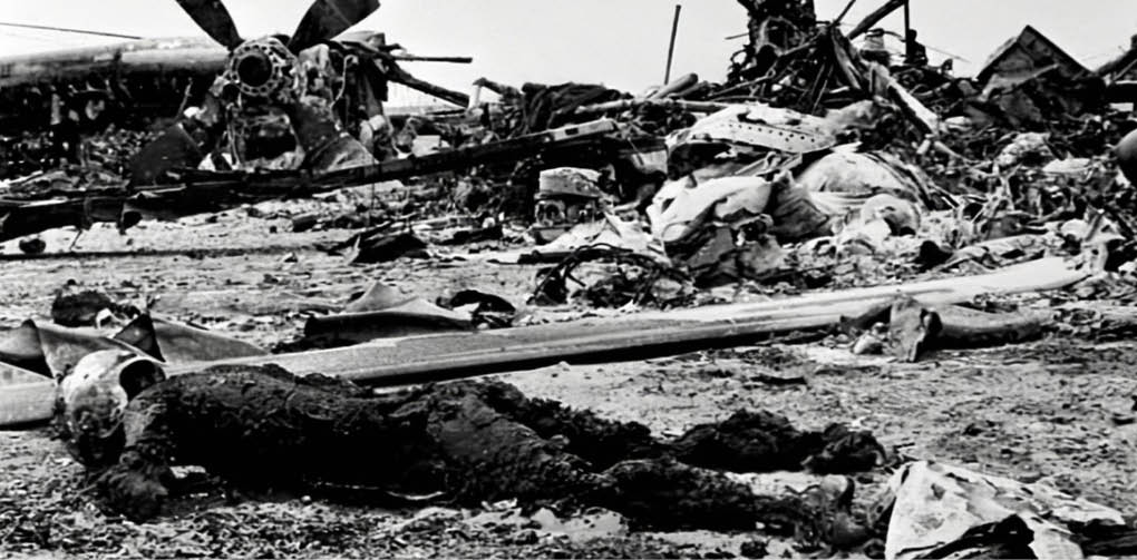 A black and white photo of a plane crash site with a plane in the background and a nude figure lying on the ground. AI generated content