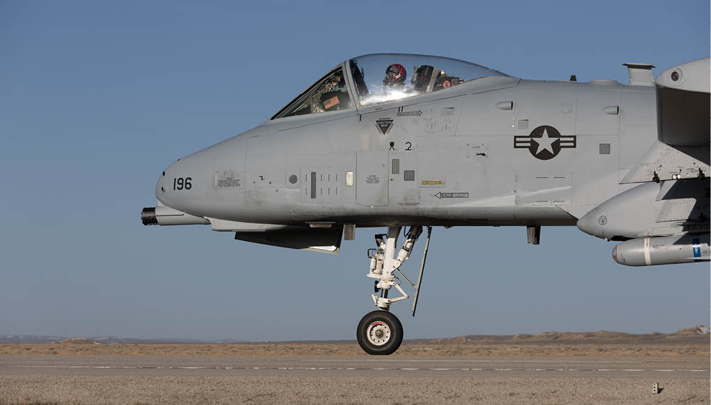 A fighter jet is flying in the sky with two people inside. AI generated content