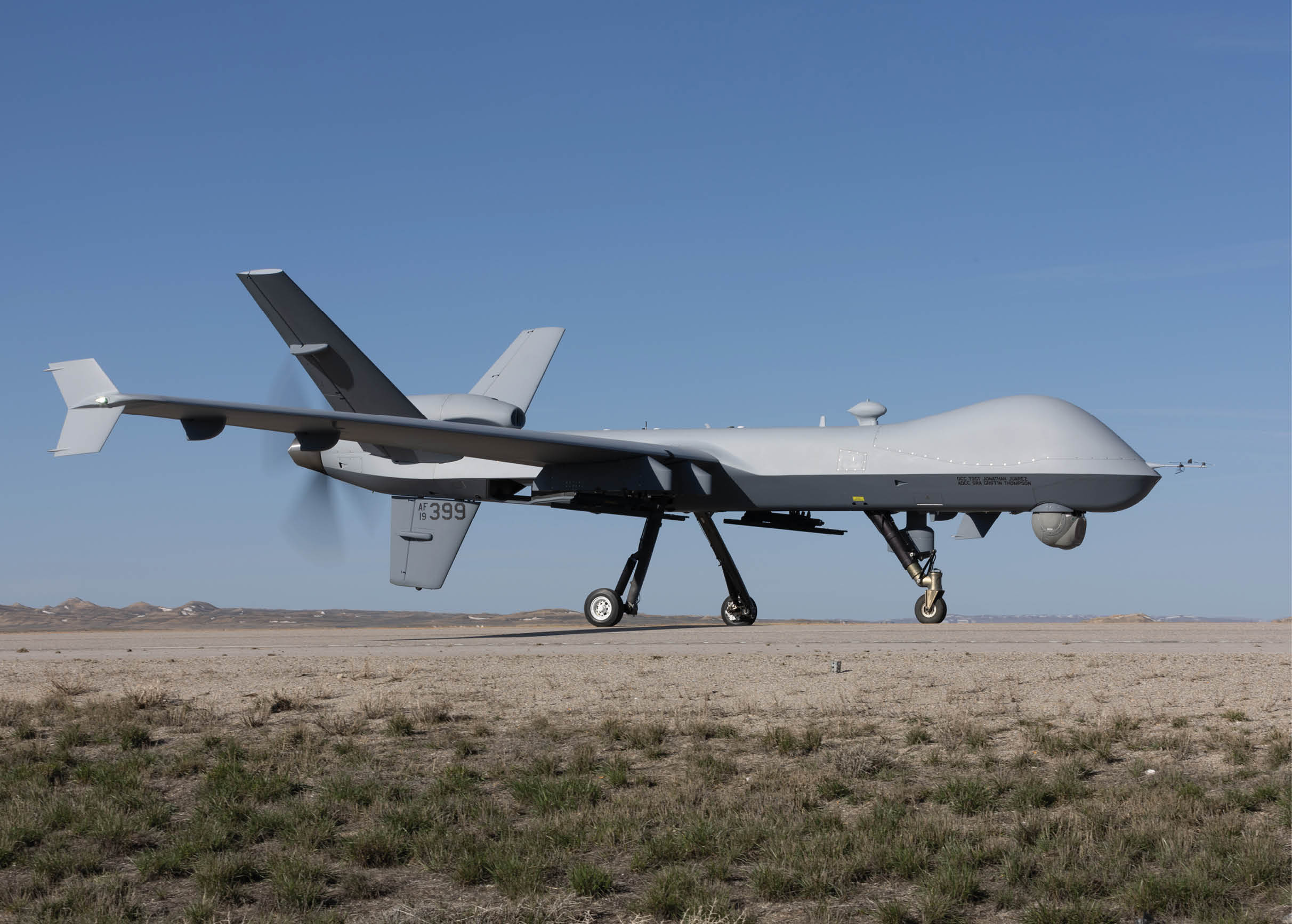 A military drone is flying in the sky. AI generated content
