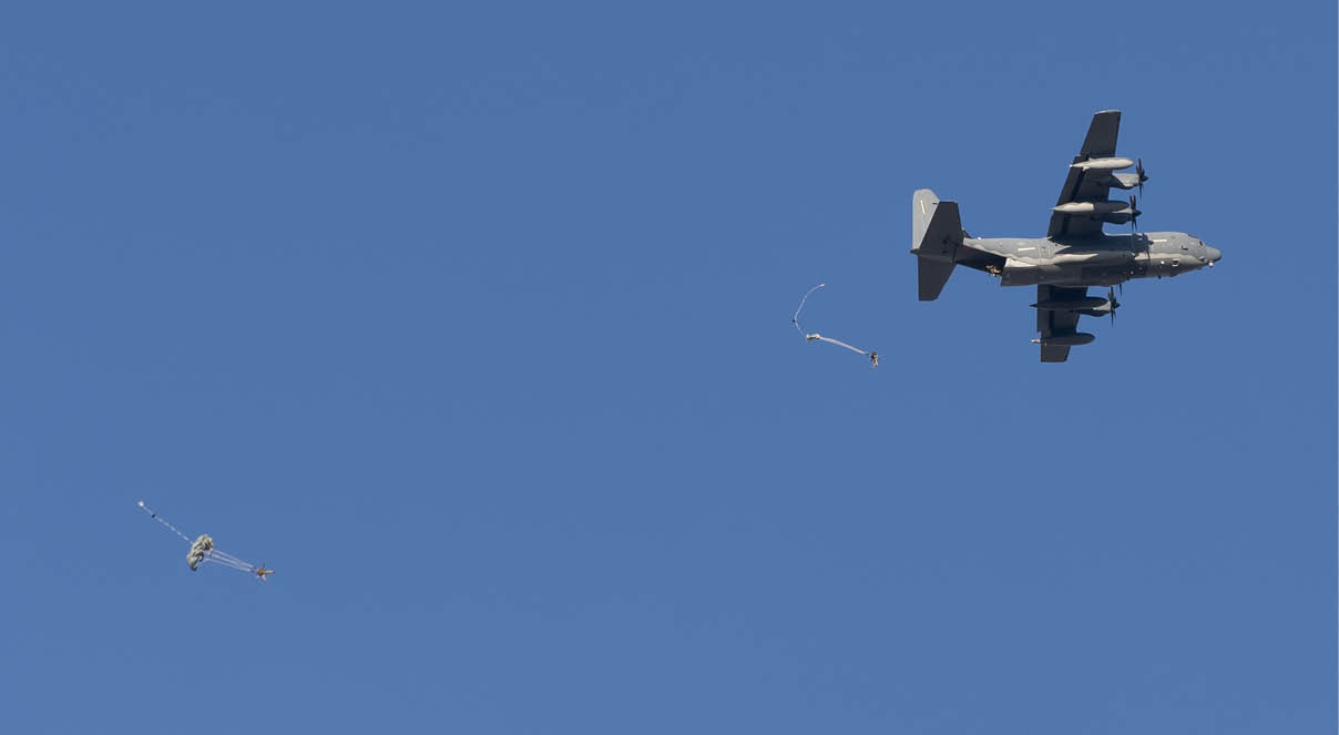 A plane is flying in the sky with a parachute trailing behind it. AI generated content