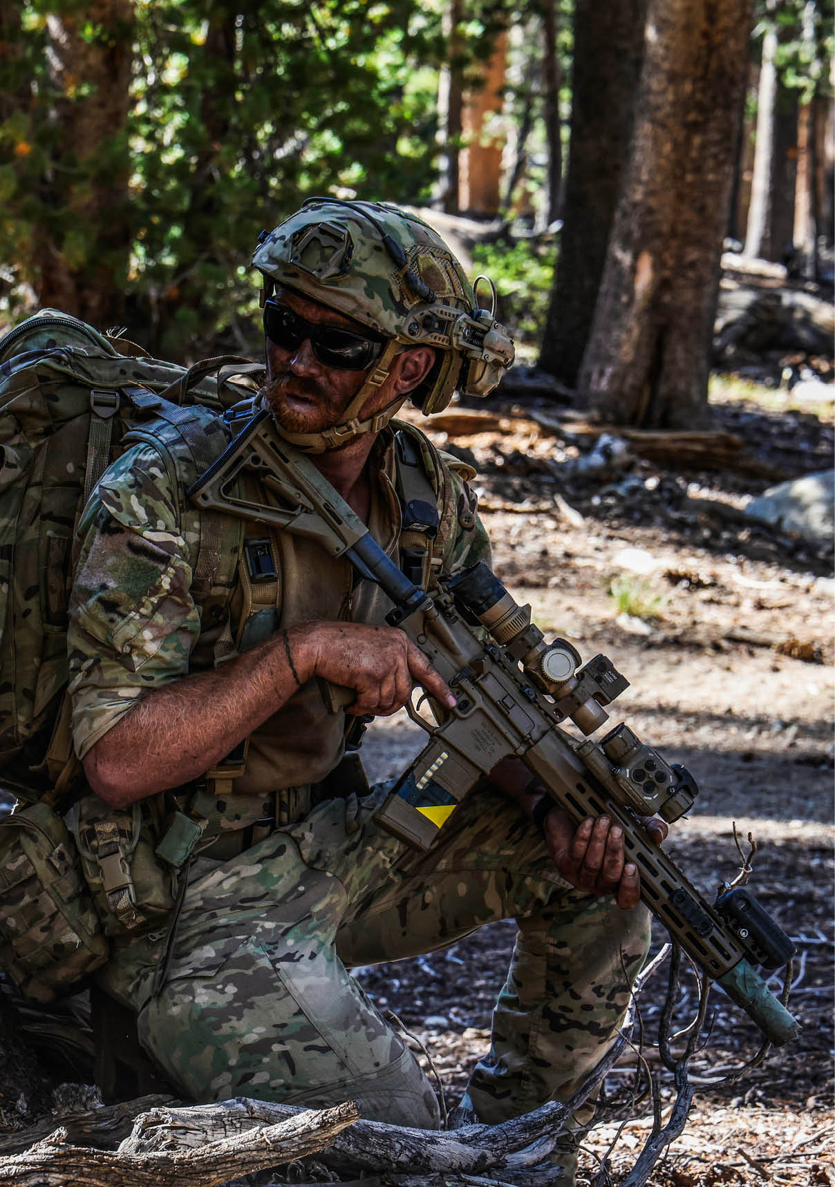 A man in camouflage is sitting on the ground with a backpack on. He is holding a gun. AI generated content