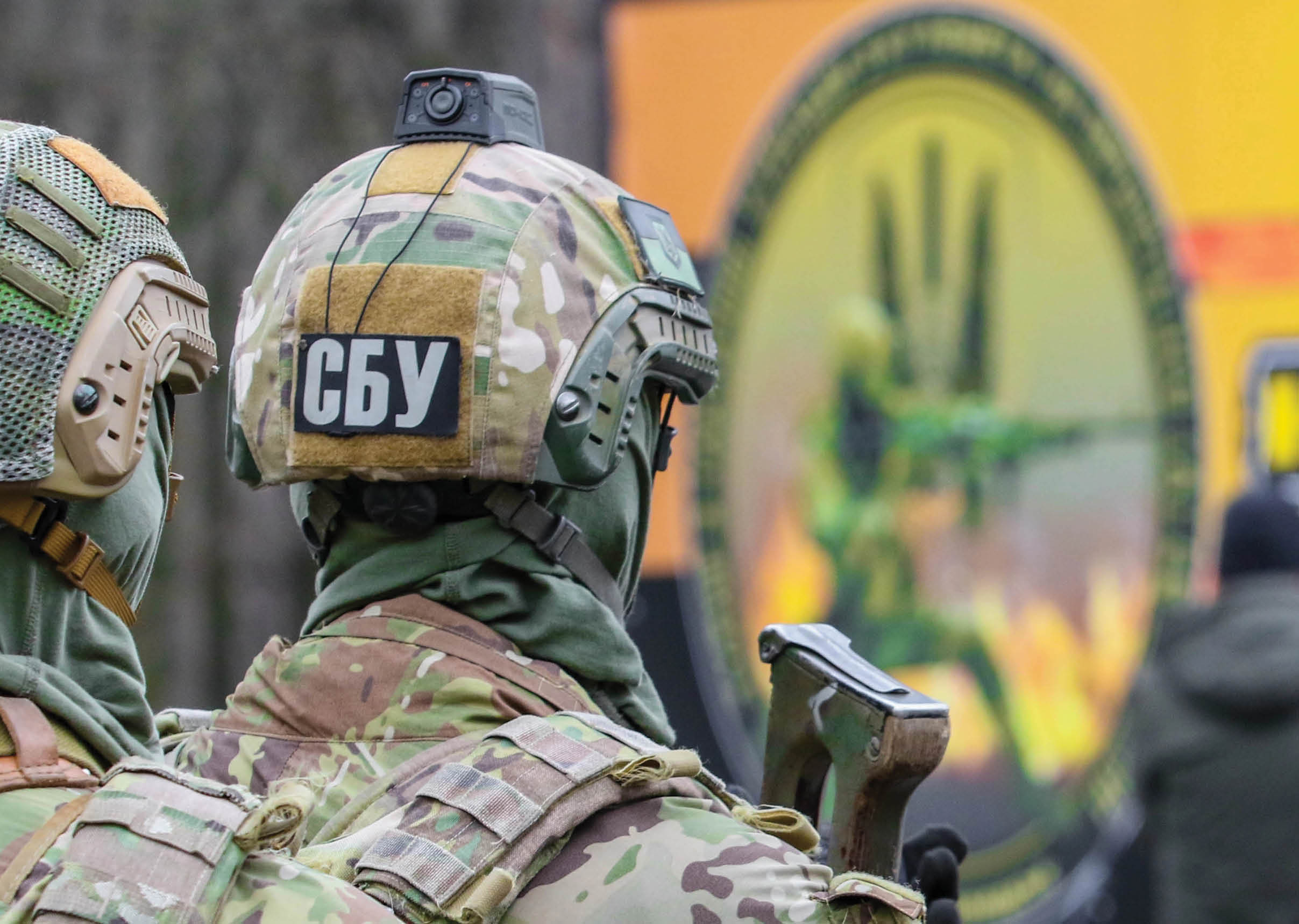 Two soldiers wearing camouflage uniforms and helmets are standing next to each other. AI generated content