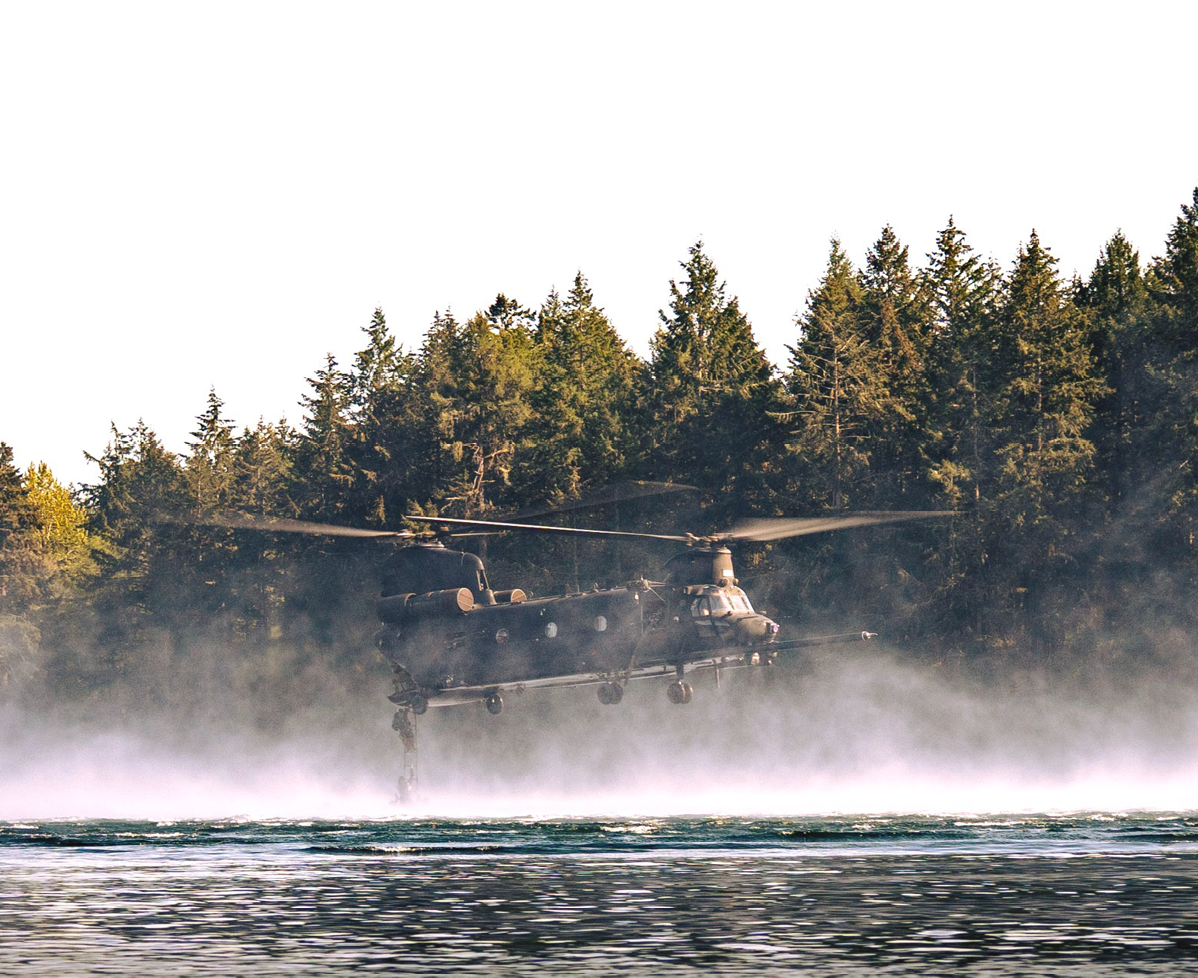 A helicopter is flying over a body of water, with trees in the background. AI generated content