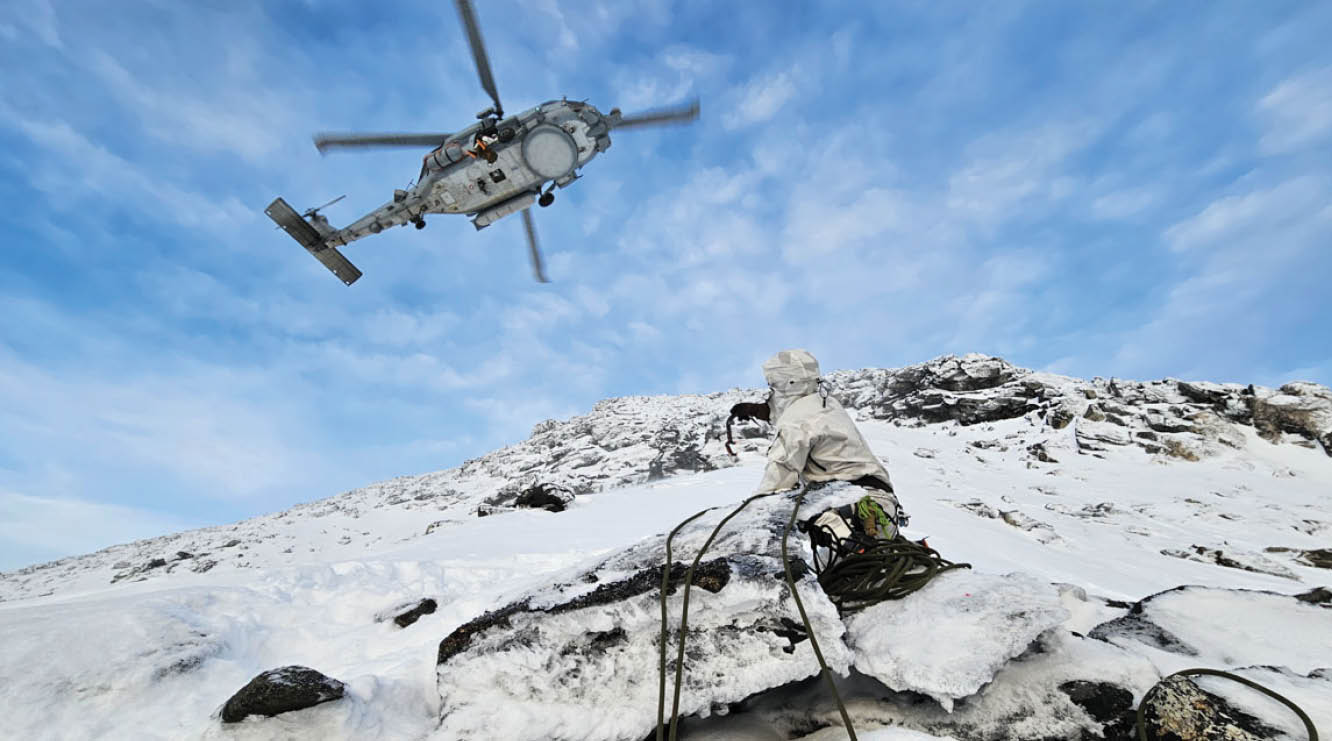 A person is standing in the snow, watching a helicopter flying overhead. AI generated content