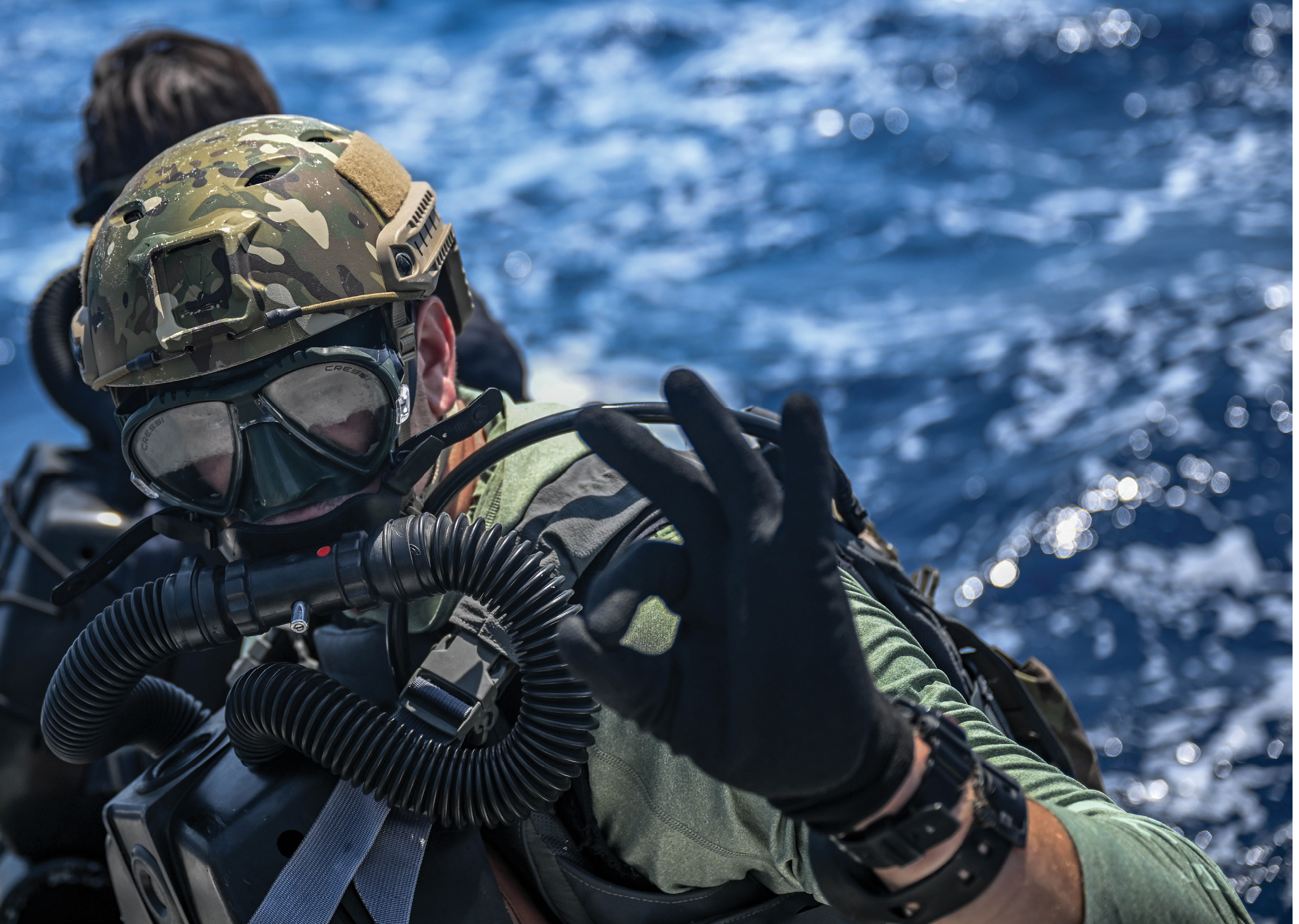 A man in a camouflage uniform is wearing a gas mask and waving. AI generated content