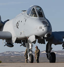 Three military personnel are standing next to a fighter jet. AI generated content