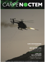 A magazine cover with a helicopter flying over a mountain. Description generated by AI
