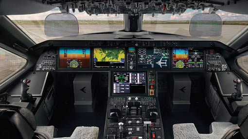 A cockpit of a plane with a lot of screens and controls. Description generated by AI