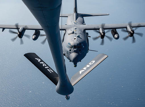 A plane with the letters ARE on the tail. Description generated by AI