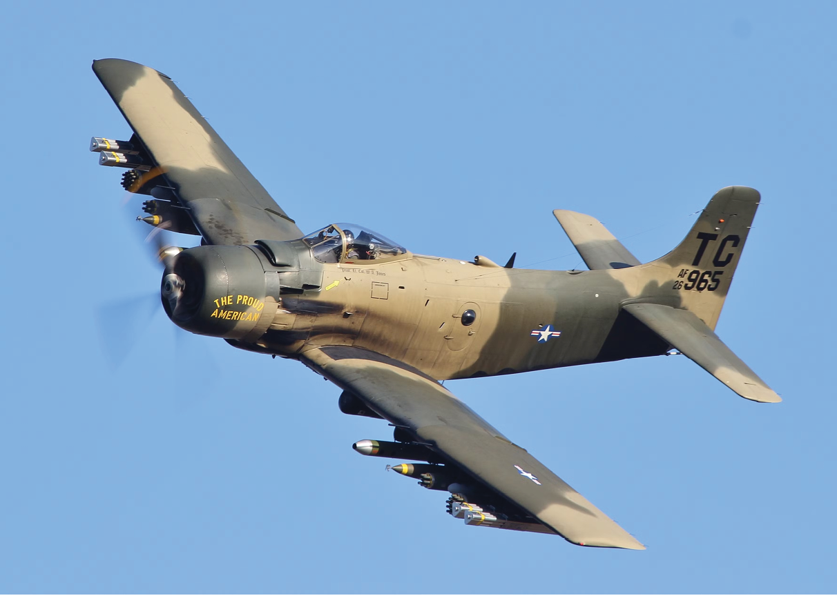 A plane flying in the sky. Description generated by AI
