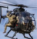 A helicopter with two men in it. Description generated by AI