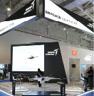 A large blue room with a black and white sign. Description generated by AI