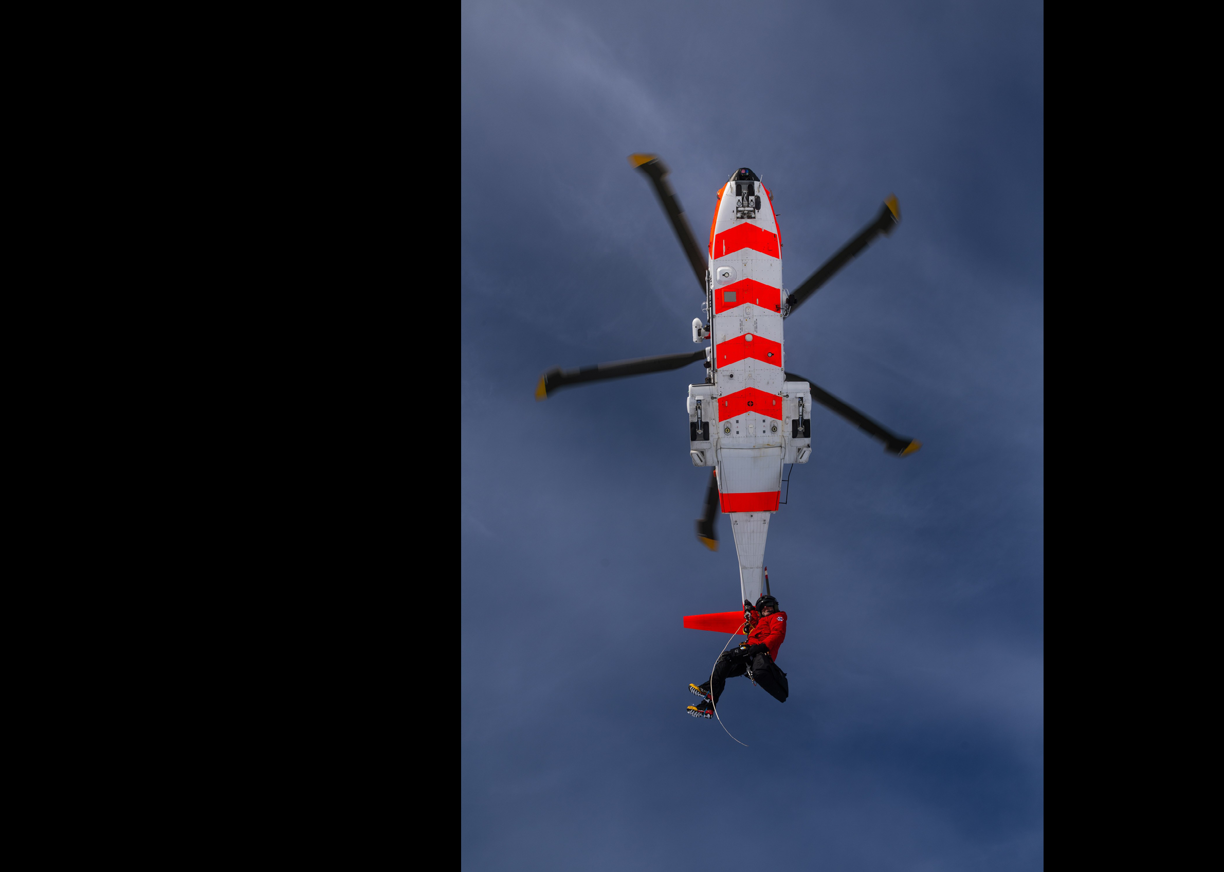 A person is being lifted into the air by a helicopter. AI generated content