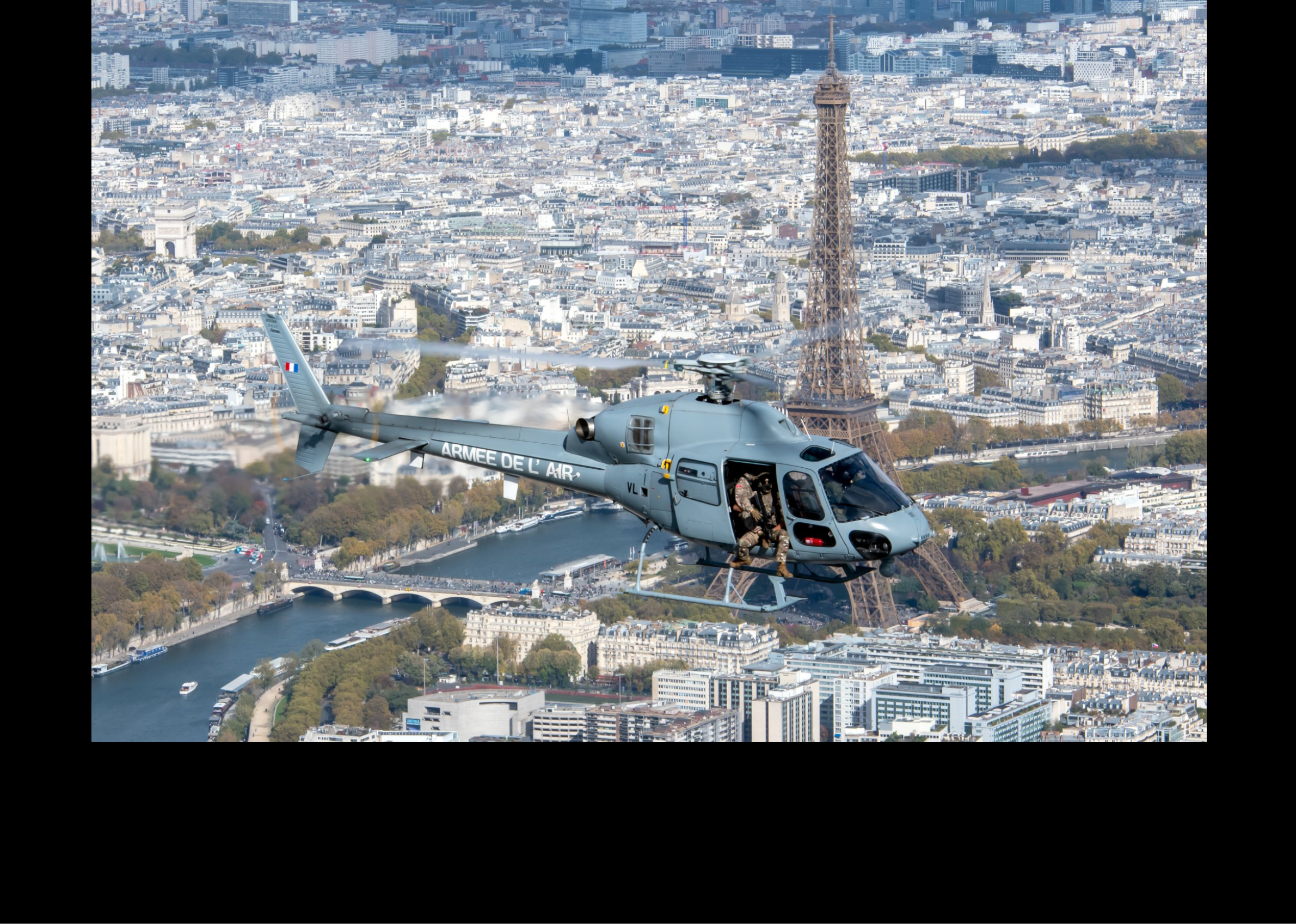 A helicopter is flying over a city with a large tower in the background. AI generated content