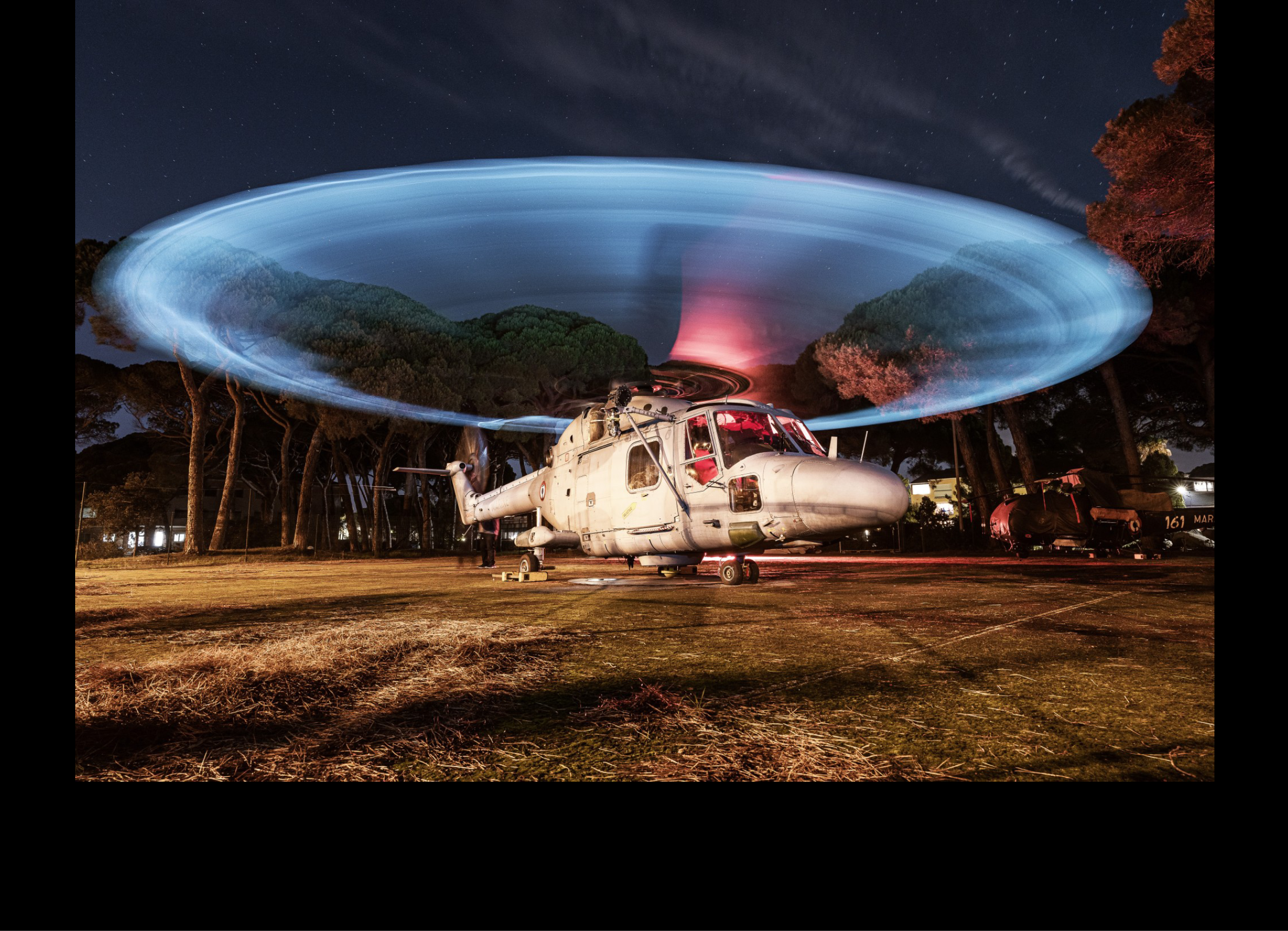 A helicopter is on the ground with its landing gear down, surrounded by trees. AI generated content