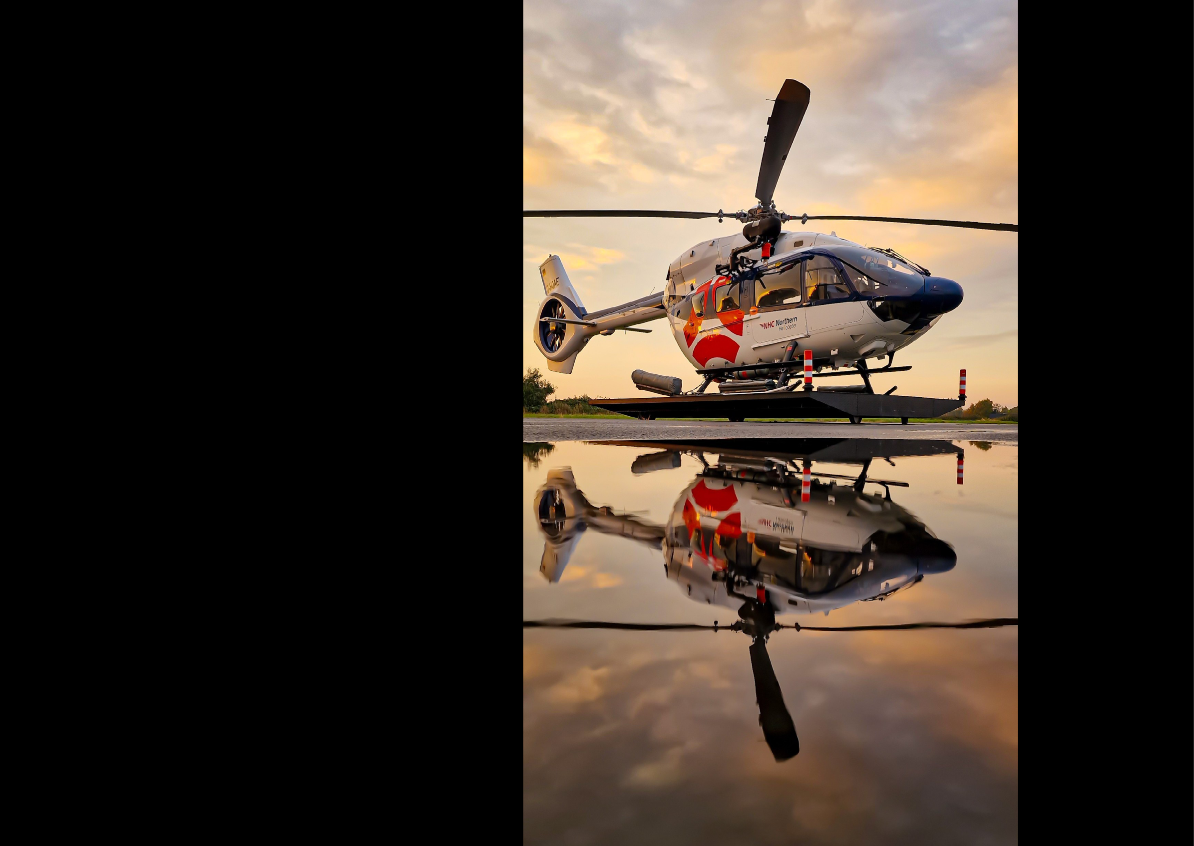 A helicopter is reflected in a body of water, with its blades visible. AI generated content