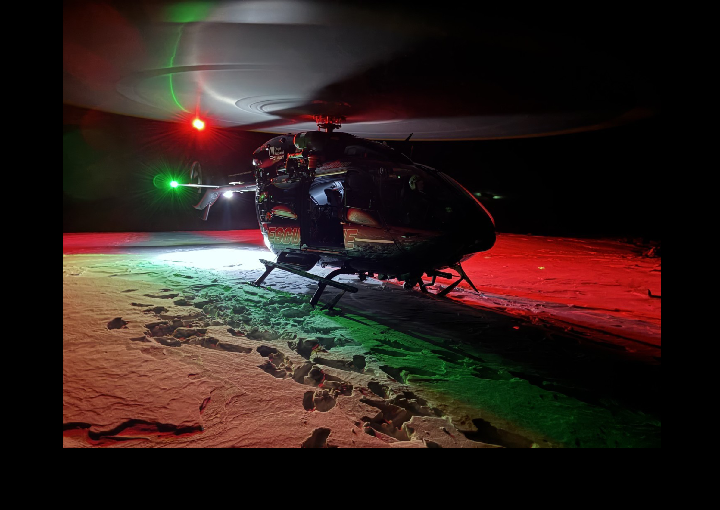 A helicopter with a red, green, and white striped tail is parked on a snowy surface. AI generated content