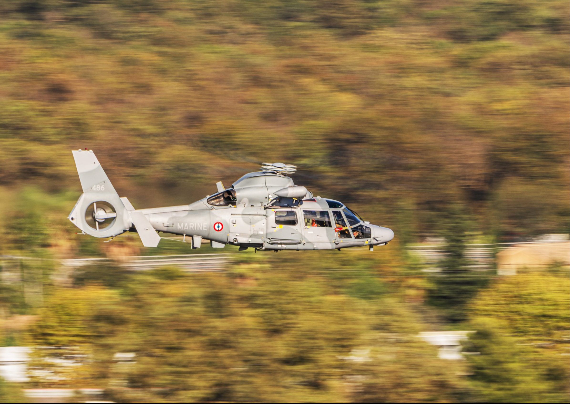 A helicopter is flying in the air with a person inside. AI generated content