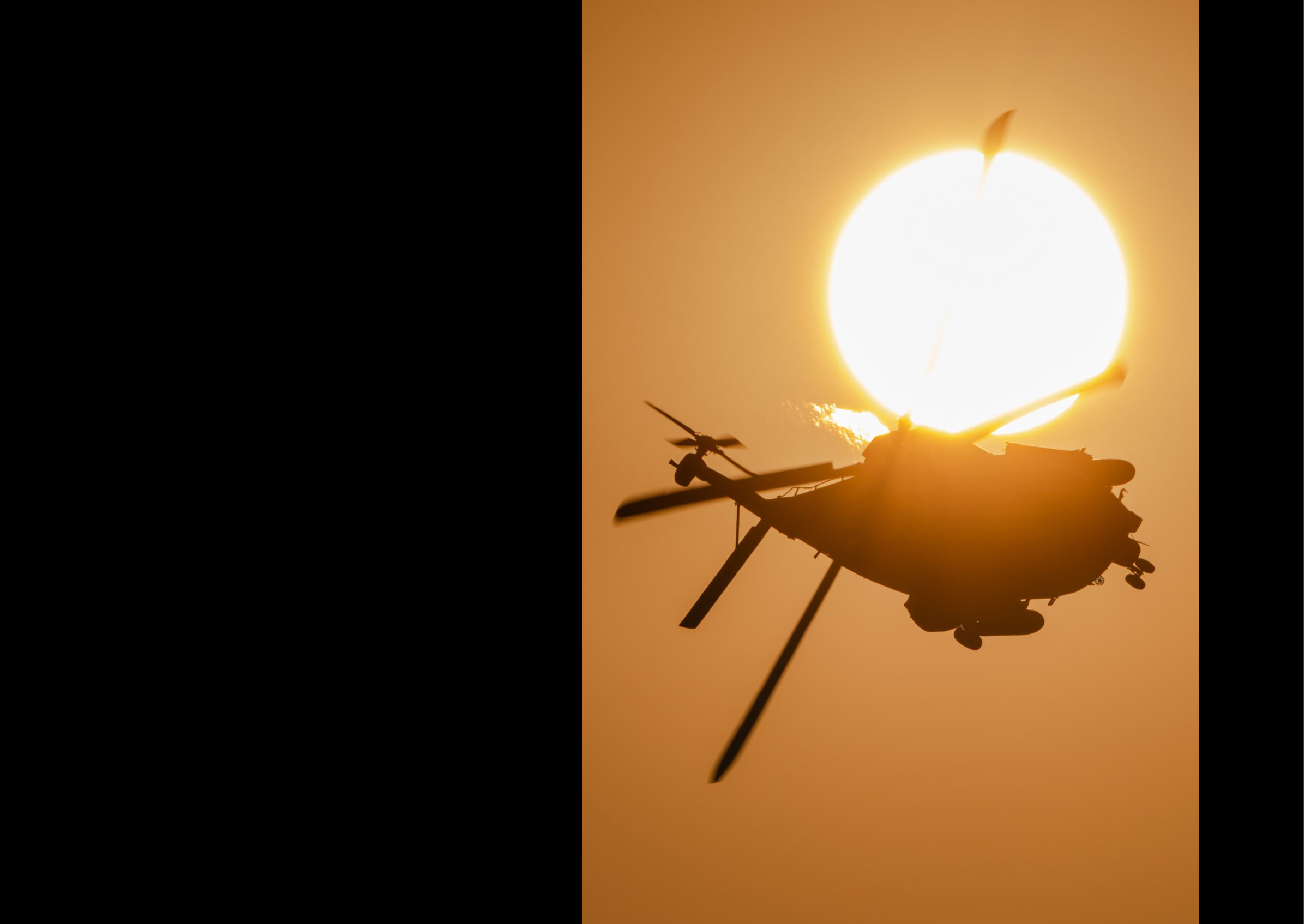 A helicopter is flying in the sky with the sun in the background. AI generated content