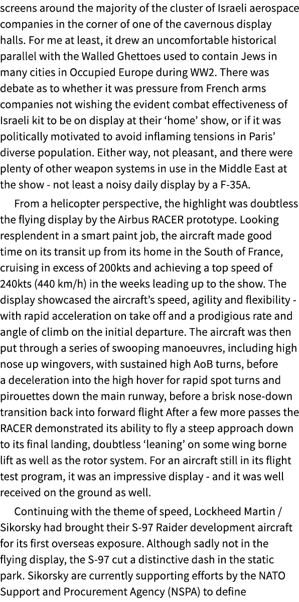 screens around the majority of the cluster of Israeli aerospace companies in the corner of one of the cavernous displ...