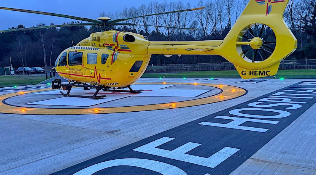 A yellow helicopter is parked on a runway. AI generated content