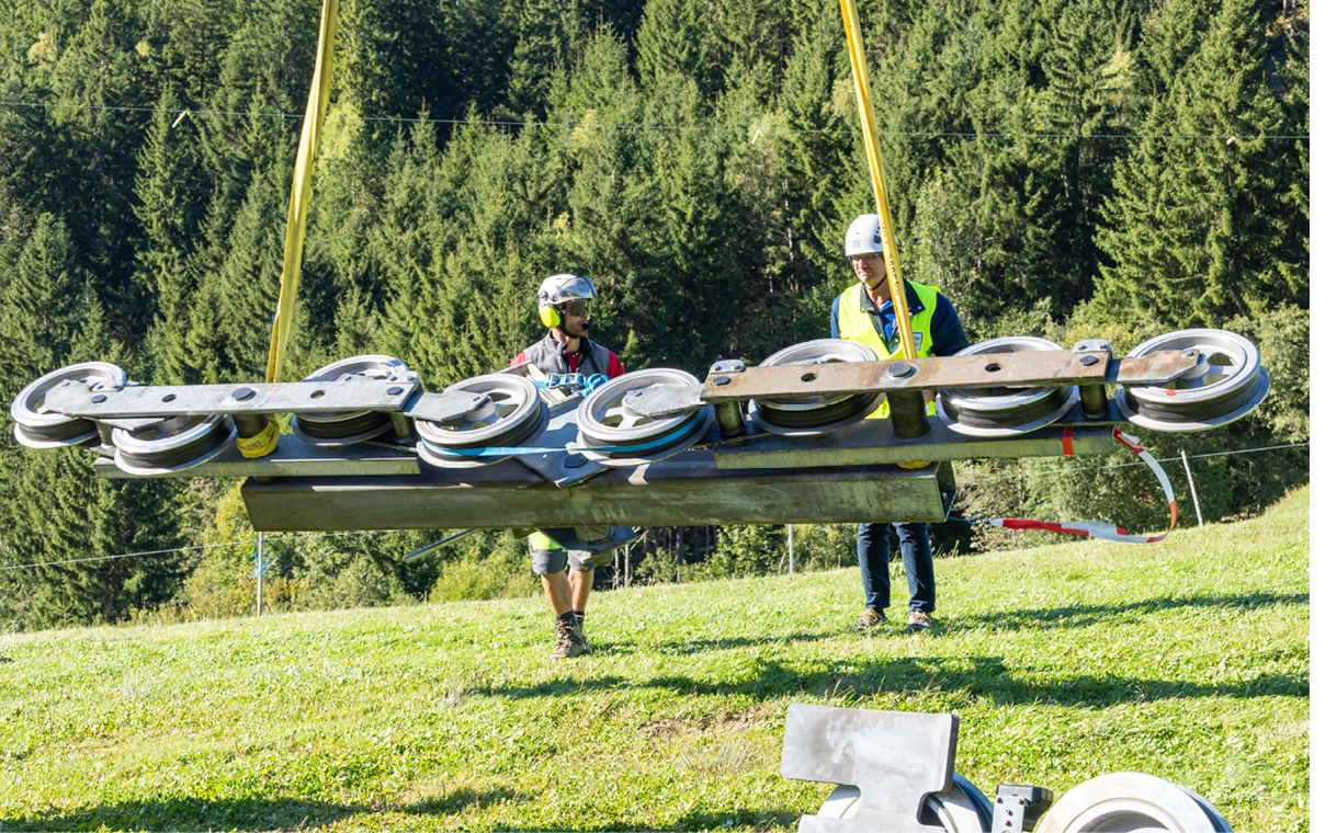 Two men are working on a large metal object in a grassy field. AI generated content