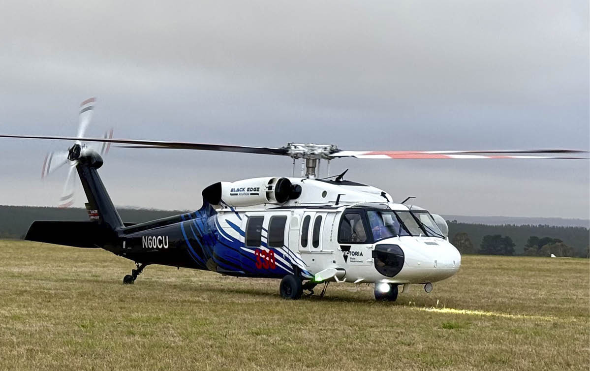 A large helicopter is parked on a grassy field. AI generated content