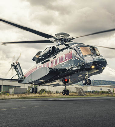 A blue truck is being loaded into a large building. AI generated content