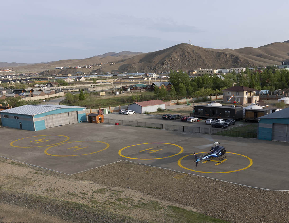 A large airplane is on a runway with a yellow circle painted on the ground. AI generated content