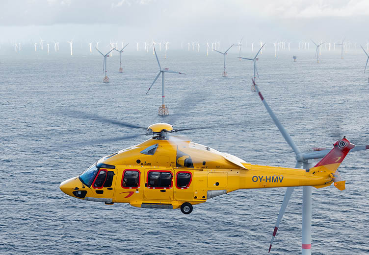 A yellow helicopter with a propeller is flying over the ocean. AI generated content