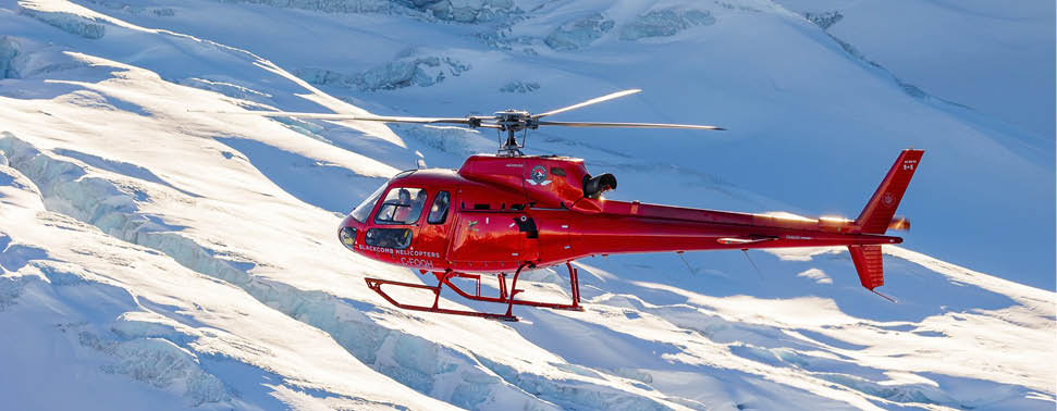 A red helicopter is flying over a snowy mountain. AI generated content