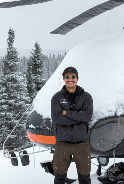 A man wearing a black hat and a black jacket is standing in front of a helicopter. AI generated content