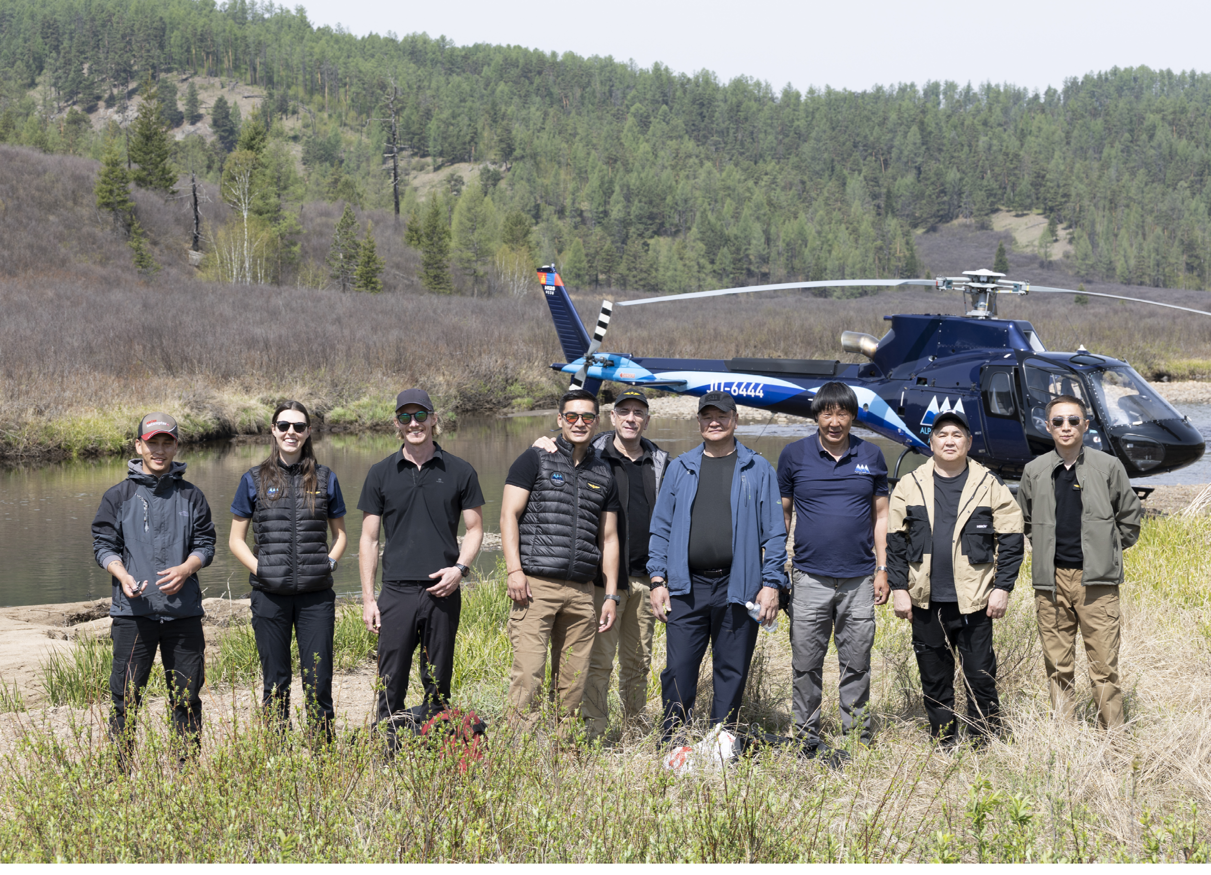 A group of people pose in front of a helicopter. AI generated content