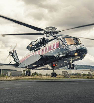 A blue truck is being loaded into a large building. AI generated content