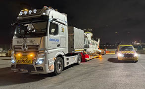 A large truck is hauling a plane on a trailer. AI generated content